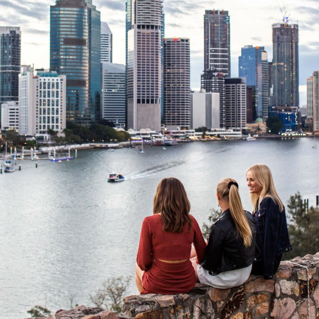 kangaroo point cliff skyline with girls looking out to the brisbane river