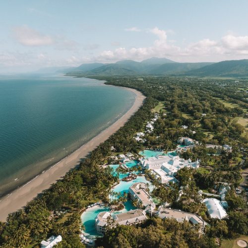 Aerial view of the luxurious resort set amongst lush tropical gardens and Four Mile Beach